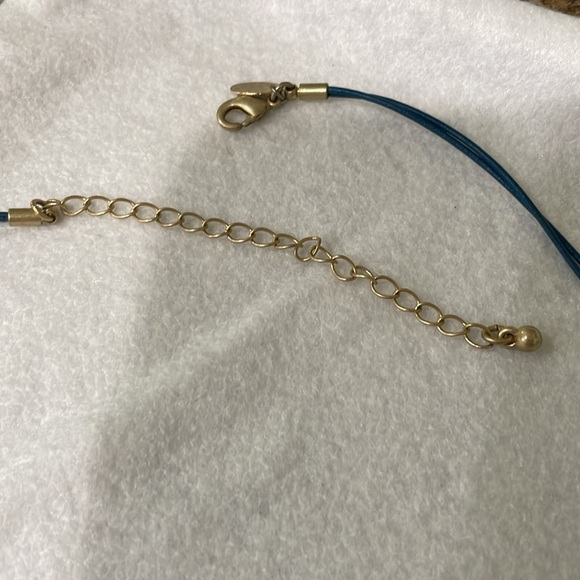 Lia Sophia Spotlight Crystal
Pave Coin Gold Tone Pendant Blue
Cord Necklace - Picture 5 of 6